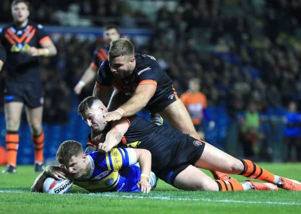 Leeds Rhinos' Ash Handley dives in to score his side's second try.