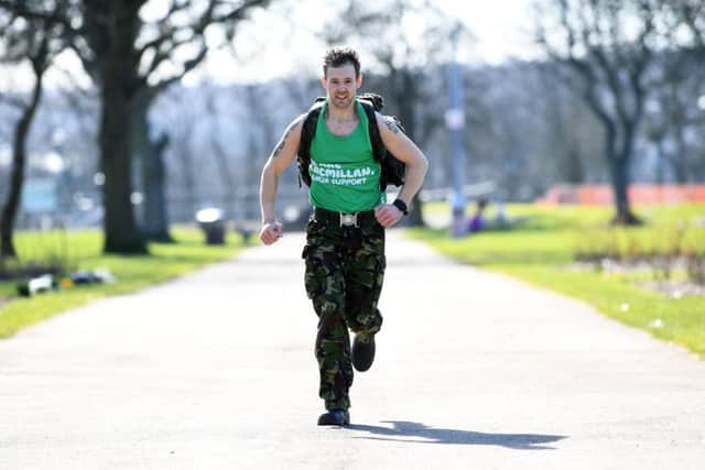 Marathon Man: Ex-soldier Danny Walker who will be running the Manchester marathon in army combats and a 44kg weight on his back.