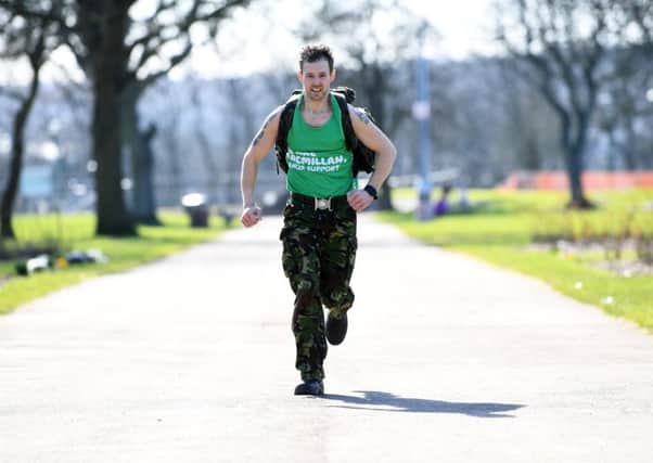 Marathon Man: Ex-soldier Danny Walker who will be running the Manchester marathon in army combats and a 44kg weight on his back.