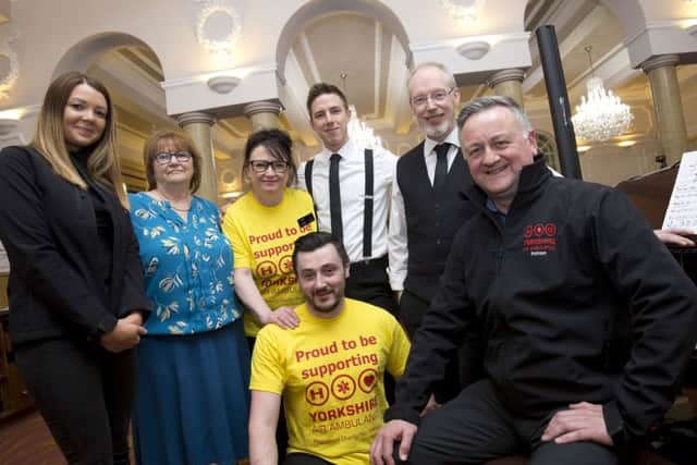 GUEST: Weatherman Jon Mitchell, far right, helped at the Wetherby Whalers charity fundraiser.