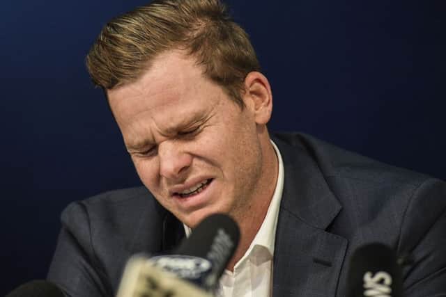 Sorry: Australia captain Steve Smith reacts during his press conference at Sydney International Airport.