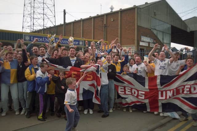 Leeds United fans celebrate outside Elland Road after winning the title in 1992.