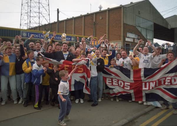 Leeds United fans celebrate outside Elland Road after winning the title in 1992.