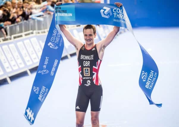 Great Britain's Alistair Brownlee celebrates winning the Elite Men Columbia Threadneedle World Triathlon Leeds. PRESS ASSOCIATION Photo. Picture date: Sunday June 11, 2017. See PA story TRIATHLON Leeds. Photo credit should read: Danny Lawson/PA Wire