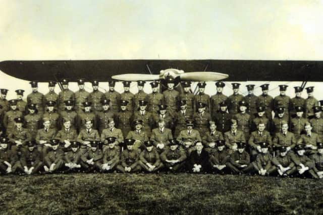 Date: 14th March 2012.
Leeds Bradford Airport 80th Anniversary Exhibition held at Leeds Central Library. Pictured A copy photograph 609 (West Riding) Squadron personnel infront of a Hawker Hind just after formation in 1936.