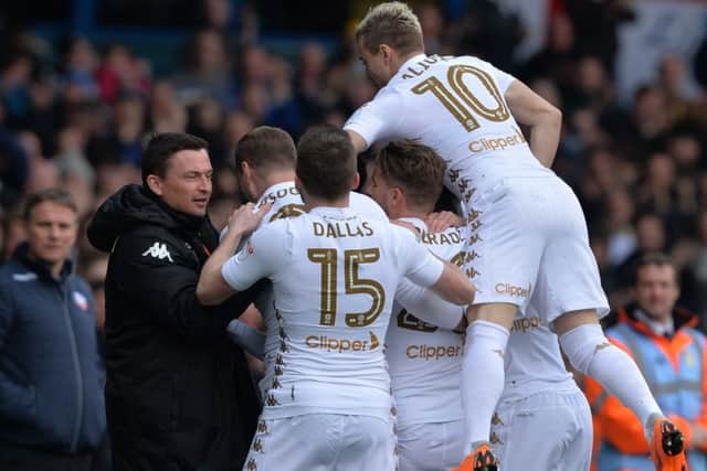 Caleb Ekuban celebrates his goal against Bolton with team-mates and head coach Paul Heckingbottom. PIC: Bruce Rollinson