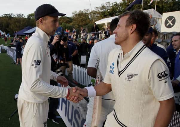 Well played: England's Joe Root, left, shakes the hand of New Zealand's Neil Wagner.
