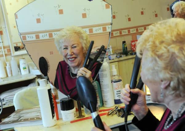 29 March 2018.... Doreen Simpson celebrates 50 years of her hairdressing business in Hunslet, Leeds. Picture Scott Merrylees
