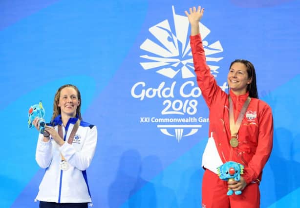 England's Aimee Willmott (right) with her gold medal and Scotland's Hannah Miley (silver) who won silver in the Women's 400m Individual Medley at the Optus Aquatic Centre. Picture: Danny Lawson/PA