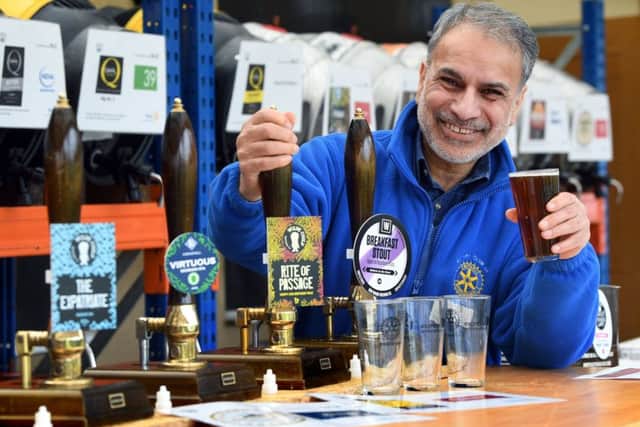 The North Leeds Charity Beer Festival celebrates its seventh year and returns to North Leeds Cricket Club, organised by the Rotary Club of Roundhay.
President Gurminder Singh admires the beer.
6th April 2018.