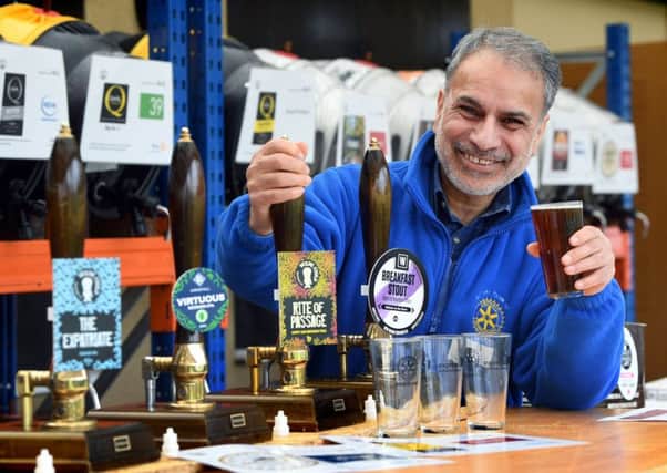 The North Leeds Charity Beer Festival celebrates its seventh year and returns to North Leeds Cricket Club, organised by the Rotary Club of Roundhay.
President Gurminder Singh admires the beer.
6th April 2018.