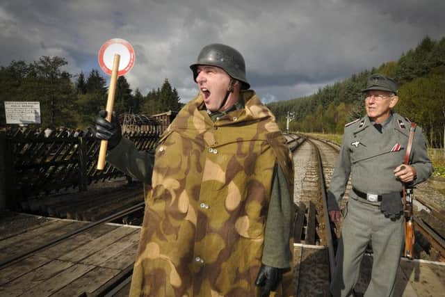 Levisham Station the Germans take over ,halt .The Officers shout out commands..Picture Richard Ponter 124155b