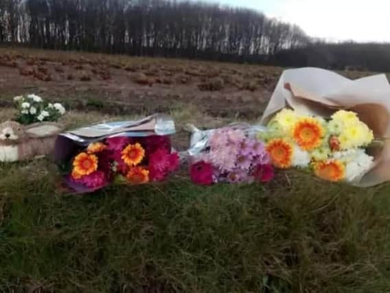 Floral tributes left at the scene in Mr Boocock's memory.