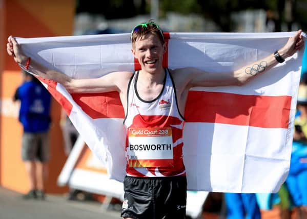 Leeds' Tom Bosworth celebrates taking silver in the Men's 20km Race Walk Final during day four of the 2018 Commonwealth Games.