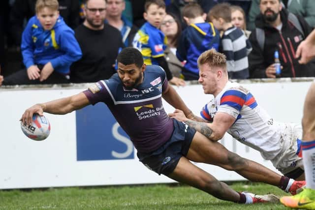 Captain marvel, Kallum Watkins scores the opening try for Leeds at Wakefield. PIC: Jonathan Gawthorpe