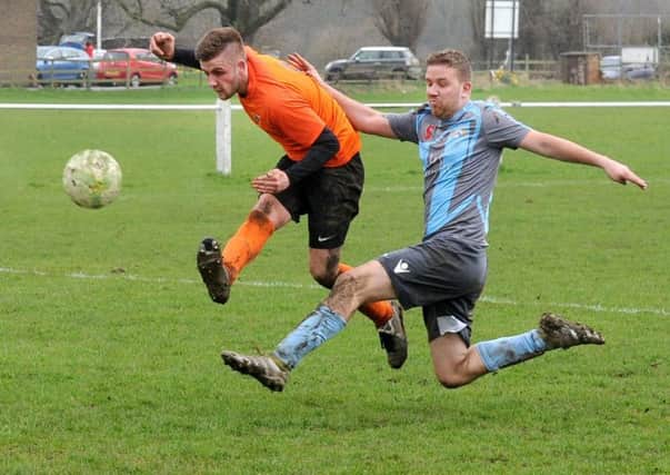 Nick Painthorpe scores the fourth goal to seal the game for Otley Town in the 4-1 win over Swillington Saints in West Yorkshire League Division Two. PIC: Steve Riding