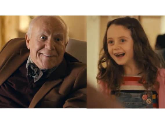 Grandad beams as his grand-daughter turns up to see him enjoying life to the full in a new McCarthy and Stone retirement apartment