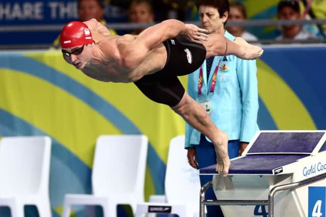 England's Benjamin Proud on his way to winning gold in the Men's 50m Freestyle Final at the Gold Coast Aquatic Centre. Picture: Danny Lawson/PA