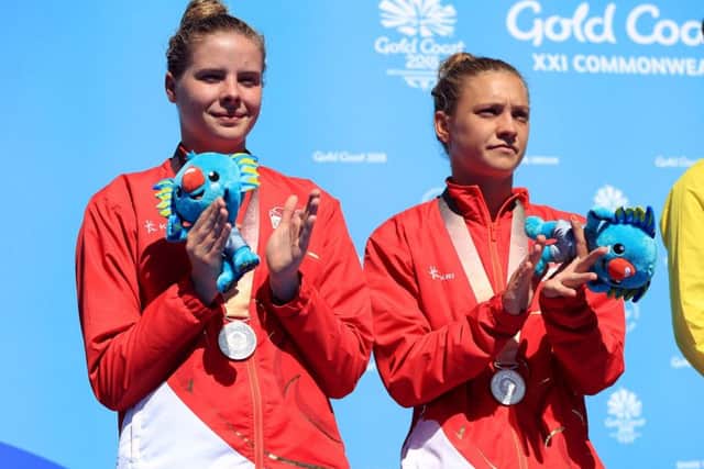 England's Alicia Blagg (right) and Katherine Torrance with their silver medals after the Women's Synchronised 3m Springboard Final.