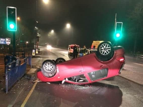 Flipped car
PIC: West Yorkshire Police