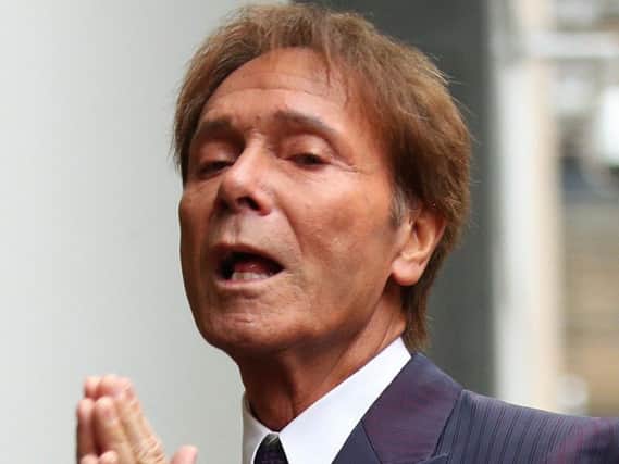 Sir Cliff arriving at court this morning