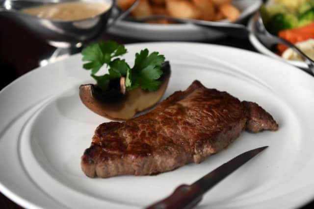 Nasar Ali claimed that he cut his thumb on a steak knife after ordering room service at a hotel in Bradford.