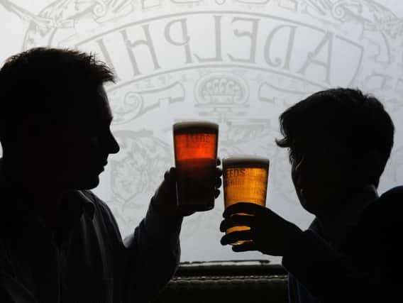 Punters enjoy their pints in The Adelphi.
