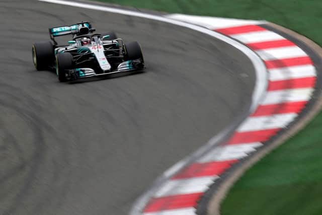 DRIVING FORCE: Britains Lewis Hamilton steers his Mercedes car during the second practice session in Shanghai. Pictures: AP/Andy Wong
