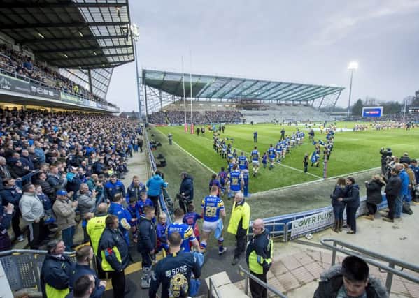 Leeds Rhinos and Wigan Warriors players come out on the pitch at Emerald Headingley. Picture: Swpix.com
