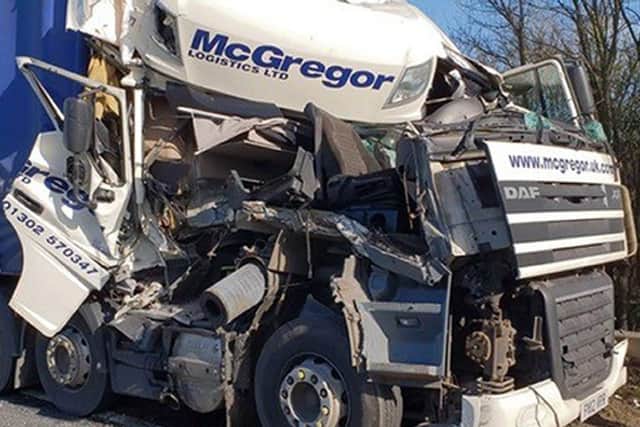 Handout photo taken with permission from the twitter feed of @roadpoliceBCH of one of the two HGVs that crashed on the A14 at Godmanchester, Cambridgeshire.