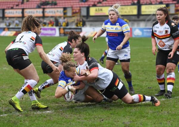 Leeds Rhinos' Lois Forsell scores a try under pressure from Bradford Bulls' Debbie Smith. Picture: swpix.com