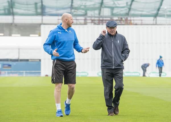 Yorkshire coach Andrew Gale and umpire Ian Gould leave the field on the first day at Headingley last Friday. The match was eventually abandoned without a ball being bowled. Picture: Allan McKenzie/SWpix.com