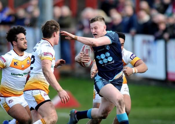 AIMING HIGH: Featherstone Rovers' Harry Newman (with ball) in action against Batley Bulldogs. Picture: Jonathan Gawthorpe