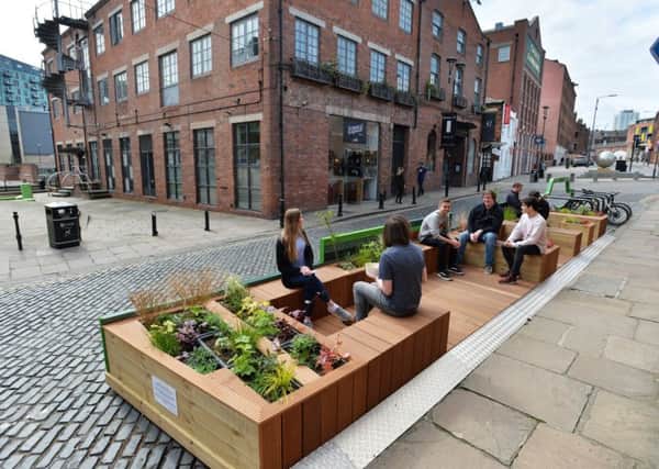 PARKING BAY: Car park spaces have been transformed into a pop-up park in The Calls.