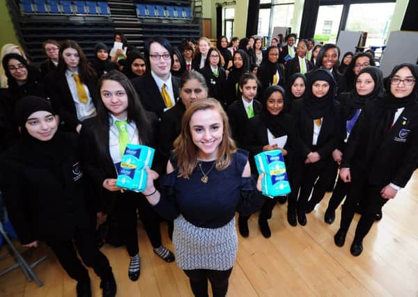 YouTuber Hannah Witton is pictured with girls at The Co-Operative School, Leeds, talking about sanitary pads, which Asda have donated over 3000 to the school. Picture by Simon Hulme