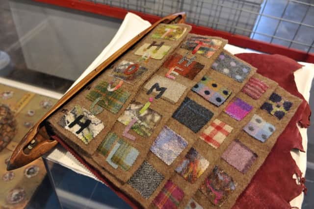 A 'sample book' part of an exhibition called The Felted Mill, which is felt creations by local felters inspired by the Leeds Industrial Musuem, Armley Mill. Picture Tony Johnson.