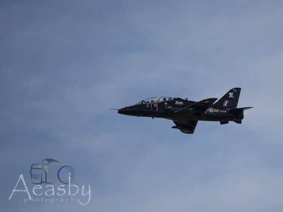 An RAF jet flying through Leeds' skies today. Photo: Andrew Easby
