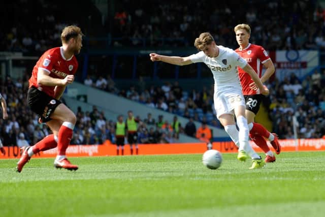 Tom Pearce scores his first goal for Leeds United against Barnsley.