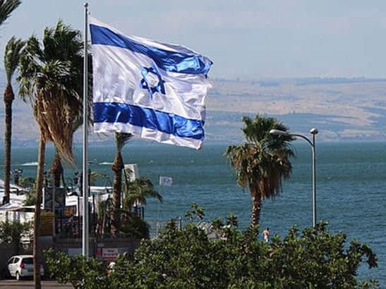 Israeli flag flutters above historic Sea of Galilee