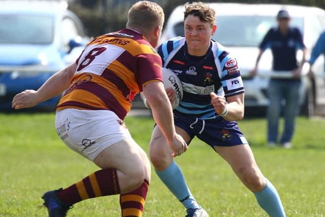 Connor Jordan, of Hunslet Warriors, takes goes one-on-one with the Dewsbury Moor defence. PIC: Craig Hawkhead