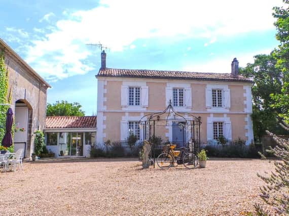 This charming 3-bed Charente house with pool is on the market with Charente Immobilier for 336,000 Euros.