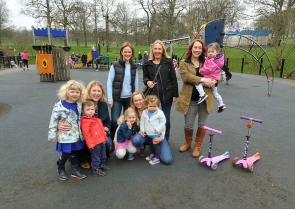 2017:  A group of parents who launched an appeal to raise Â£100,000 to refurbish and replace play equipment in Roundhay Park near the Lakeside Cafe.
Picture: Tony Johnson.