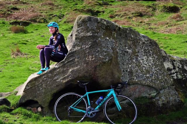 RIDING HIGH: Yorkshires Annie Simpson of the Trek Drops team up on the Cow and Calf rocks above Ilkley, scene of the finish to the second stage of next weeks Asda Tour de Yorkshire Womens Race. Picture: Simon Hulme
