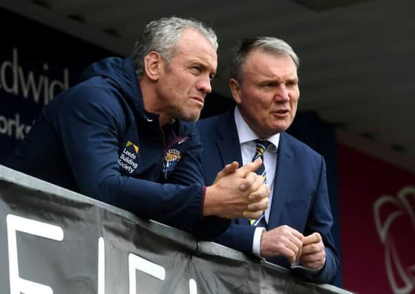 Leeds Rhinos head coach Brian McDermott chats to chief executive Gary Hetherington.