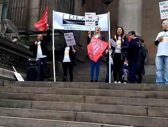 Protesters gathered outside Leeds Town Hall today. Picture: Scott Merrylees.