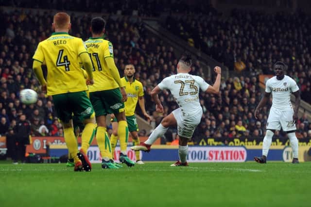 Kalvin Phillips swivels and fires Leeds in front at Carrow Road. PIC: Tony Johnson