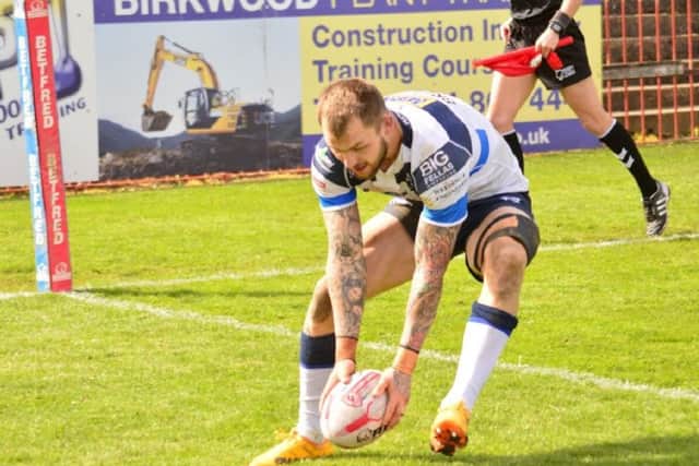 Luke Briscoe touches the ball down after scoring a try for the 15th consecutive game in Featherstone Rovers' win over Batley Bulldogs. PIC: Rob Hare