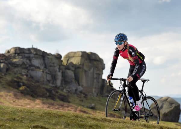 Top climb: Sophie Thackray training up the Cow and Calf.  Picture: Bruce Rollinson