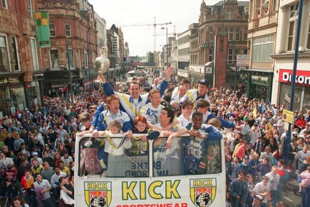 Leeds United celebrate the First Division title with an open top bus parade.