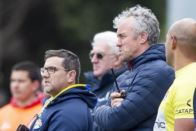 Leeds coach Brian McDermott and his backroom staff on the sidelines at Hull KR. PIC: Allan McKenzie/SWpix.com
